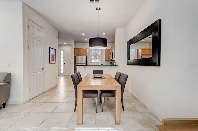 view of tiled dining area