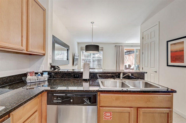 kitchen featuring hanging light fixtures, sink, a wealth of natural light, and stainless steel dishwasher