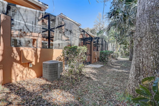 view of yard featuring central AC unit