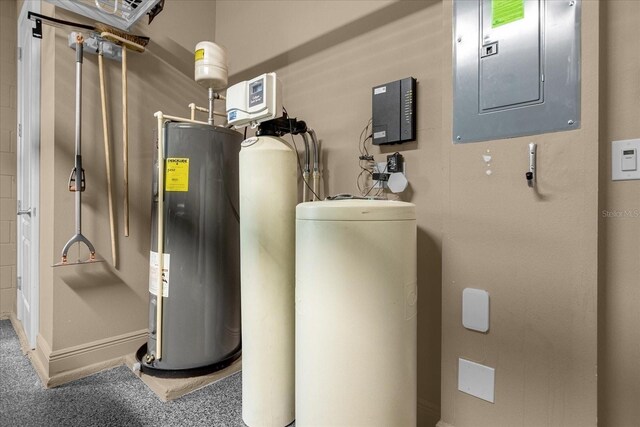 utility room featuring water heater