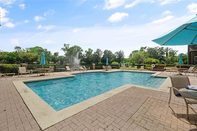 view of swimming pool featuring a patio