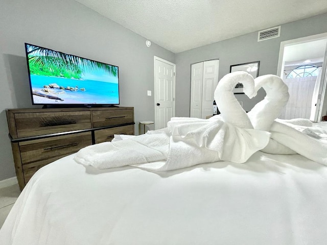 bedroom with a textured ceiling