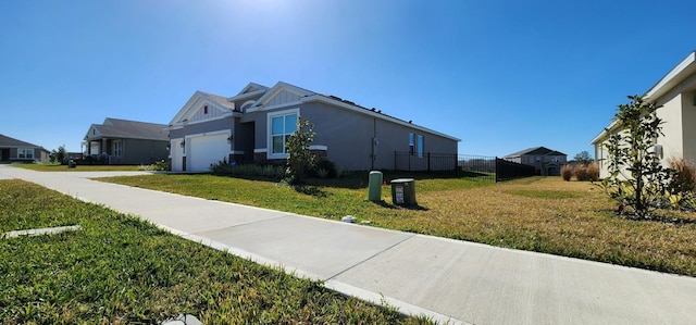 view of property exterior featuring a garage and a yard