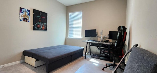 bedroom featuring light colored carpet