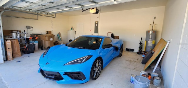 garage with electric panel, a garage door opener, and water heater