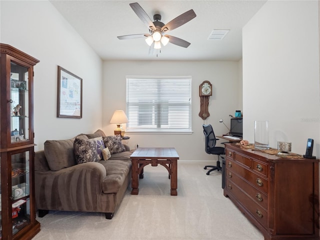 office area with light carpet and ceiling fan