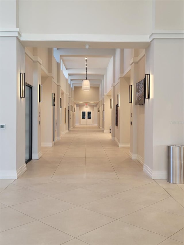 hallway with light tile flooring