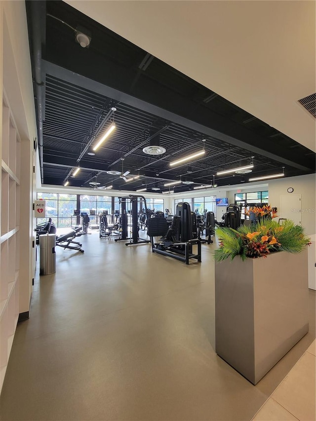 workout area featuring concrete flooring