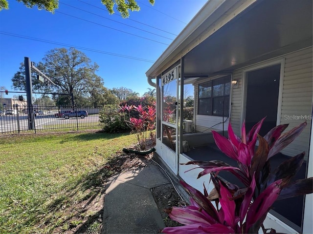 view of property exterior with a yard