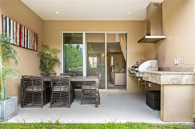 view of patio / terrace featuring an outdoor kitchen