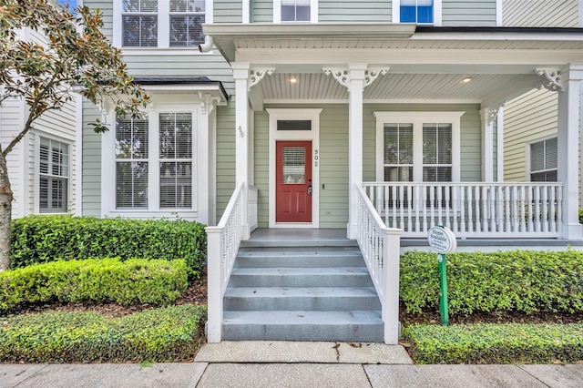 doorway to property with covered porch