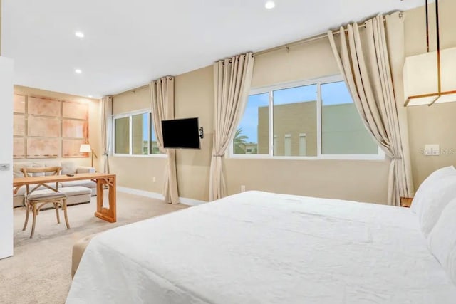 carpeted bedroom with recessed lighting and baseboards