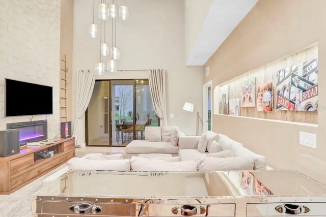 living room with a high ceiling