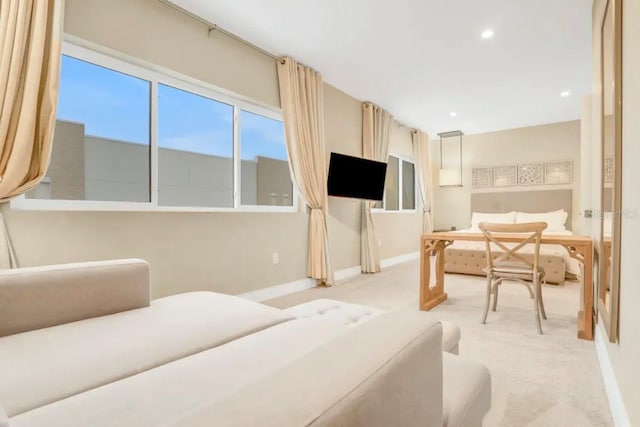 carpeted bedroom with recessed lighting and baseboards