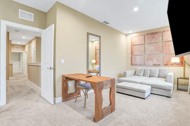 carpeted living room with visible vents, recessed lighting, and baseboards