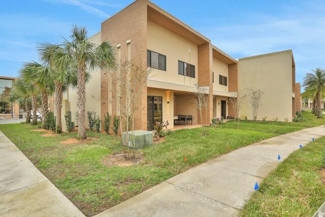 exterior space with a front yard