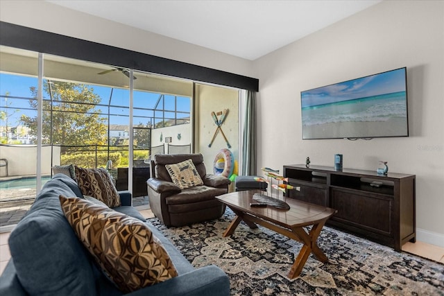 tiled living room with ceiling fan