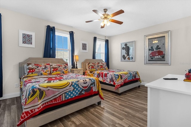 bedroom featuring wood-type flooring and ceiling fan