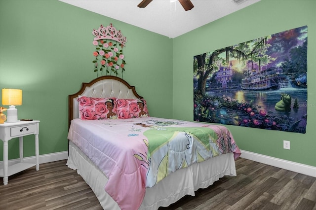 bedroom with ceiling fan and dark hardwood / wood-style floors