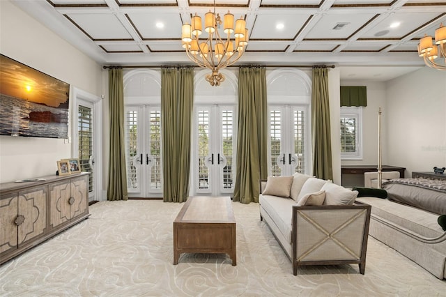 living room featuring french doors, coffered ceiling, and an inviting chandelier