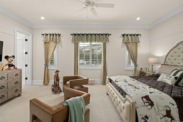 carpeted bedroom with ceiling fan and crown molding