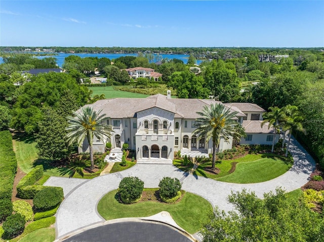 birds eye view of property with a water view