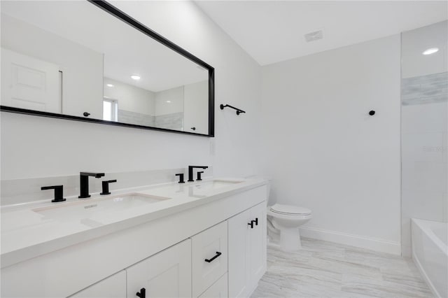 bathroom with vanity and toilet