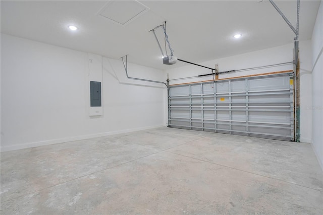 garage featuring a garage door opener and electric panel