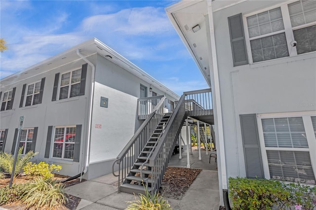 view of side of home featuring a deck