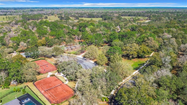 aerial view featuring a view of trees