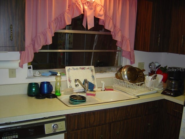 kitchen featuring dishwasher and sink