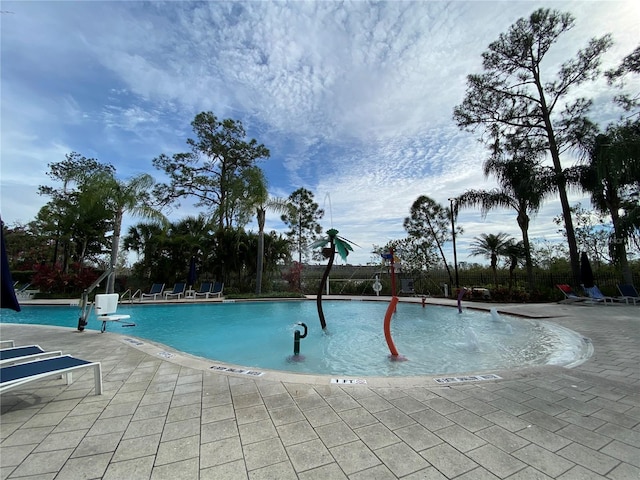 view of pool featuring a patio