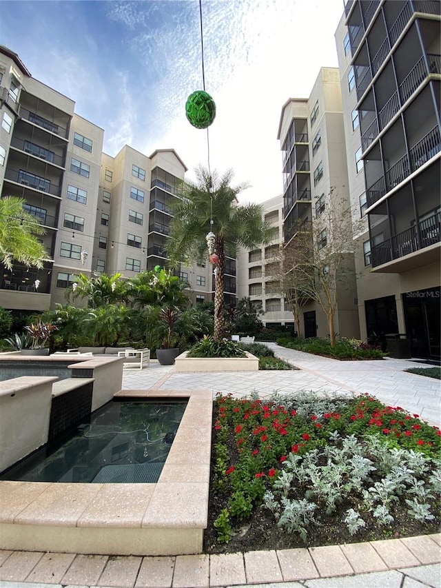 view of home's community featuring a hot tub