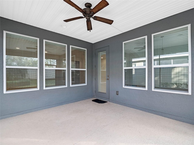 view of patio / terrace featuring ceiling fan