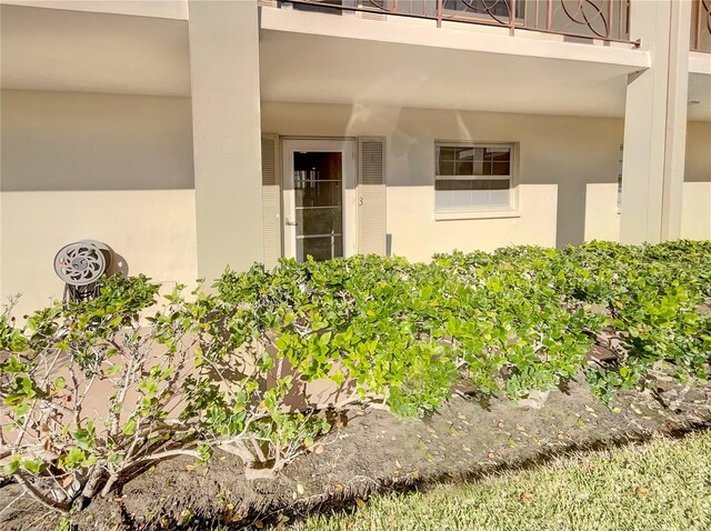 doorway to property with a balcony