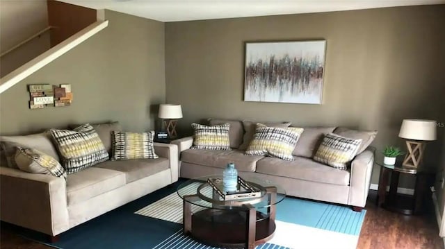 living room featuring dark hardwood / wood-style flooring