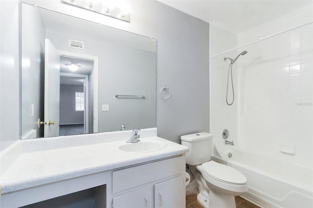 full bathroom with washtub / shower combination, vanity, and toilet