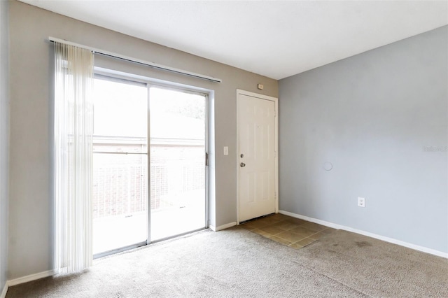 empty room with carpet flooring