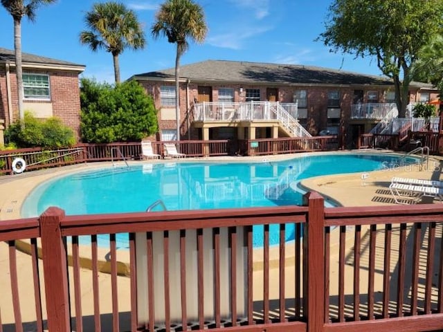 view of pool featuring a patio area