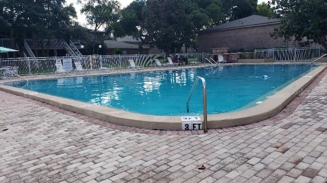 view of pool with a patio