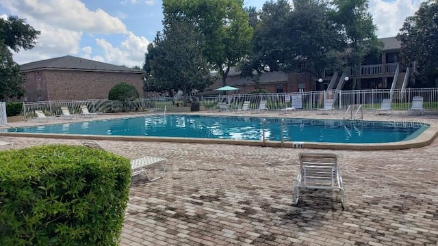 view of pool with a patio