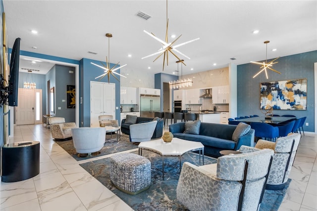 living room featuring a chandelier