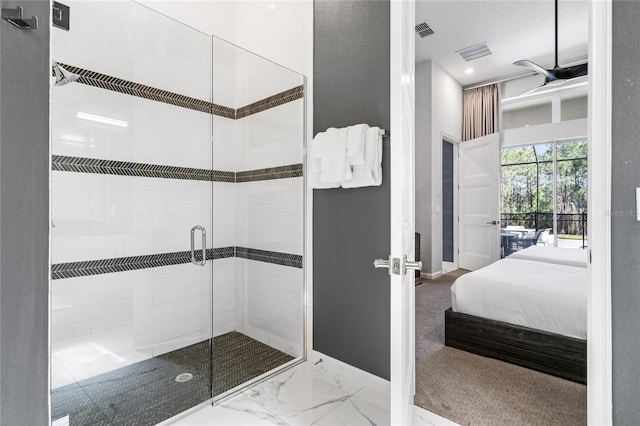 bathroom with a shower with shower door