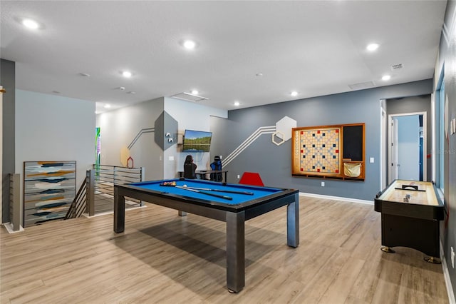 playroom with light wood-type flooring and billiards