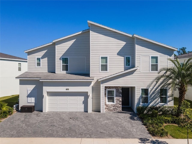 view of front of house with a garage