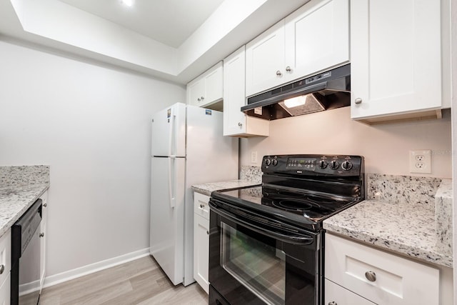 kitchen featuring light stone counters, stainless steel dishwasher, light hardwood / wood-style flooring, black / electric stove, and white cabinetry