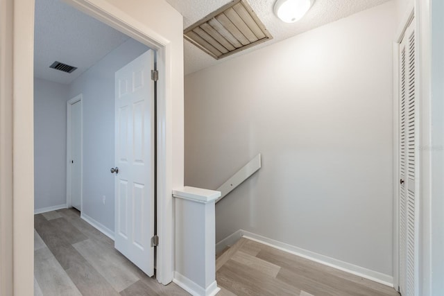 hall featuring light hardwood / wood-style floors