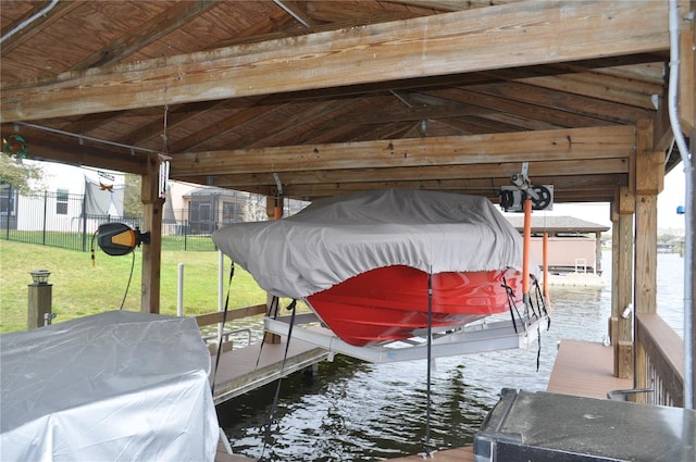 dock area featuring a water view