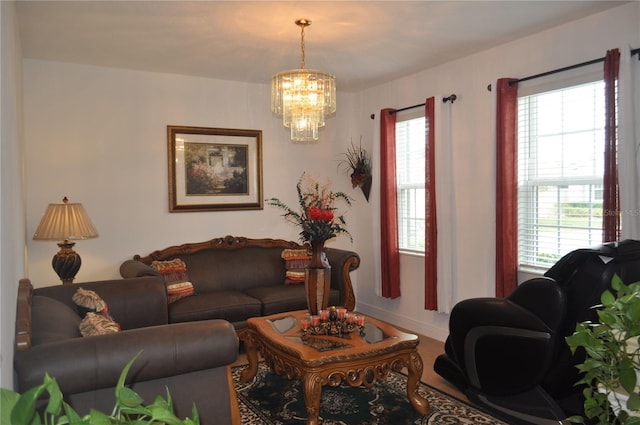 living room featuring a notable chandelier