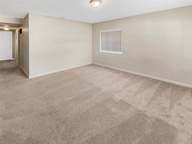 unfurnished room featuring carpet flooring